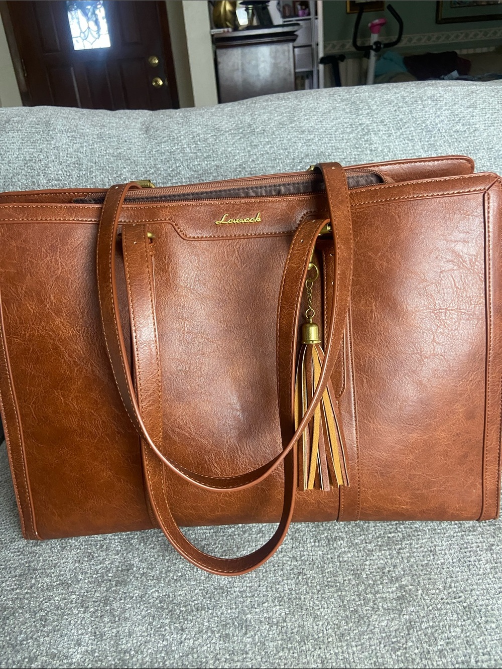 Leather-Textured Tan Tote with Tassel Accent for laptop work